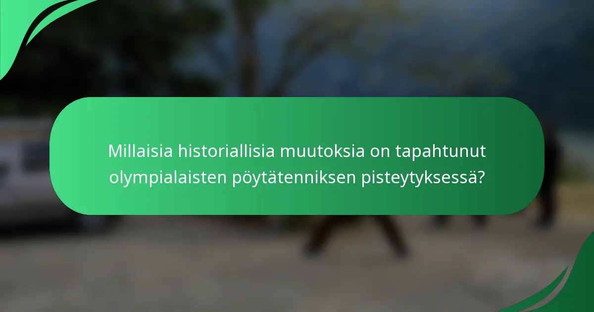 Millaisia historiallisia muutoksia on tapahtunut olympialaisten pöytätenniksen pisteytyksessä?